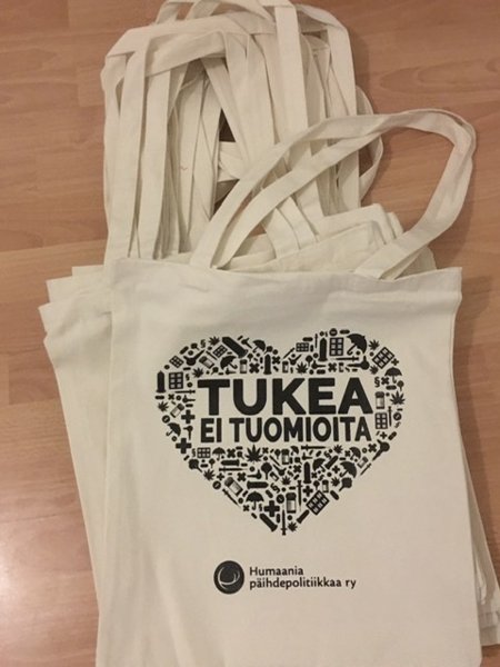 Product image of  Tukea ei tuomioita -kassi (valkoinen)