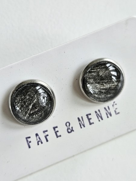 Product image of  Mustanharmaa Art nappikorvakoru