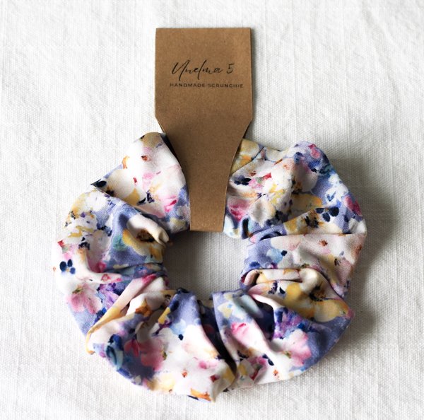 Product image of  Käsintehty hiusdonitsi – värikäs kukkakuosi