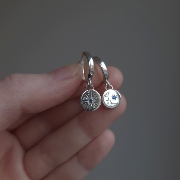 Product image of  Silver hoop earrings with hand‑engraved star and moon