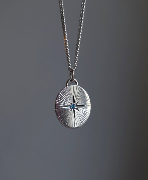 Product image of  Silver North Star pendant with natural zircon