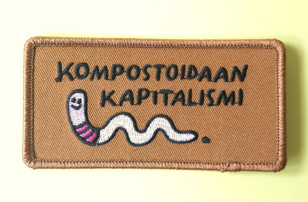 Product image of  "Kompostoidaan kapitalismi" -kangasmerkki