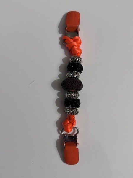 Product image of Numeroklipsi oranssi